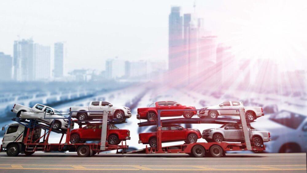 Cars on an open trailer of a car shipping company