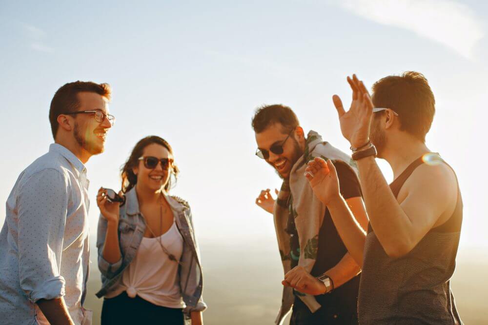 smiling youngsters taking a selfie