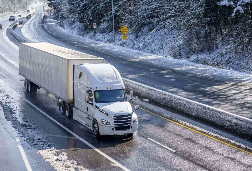 A truck on the snowy road