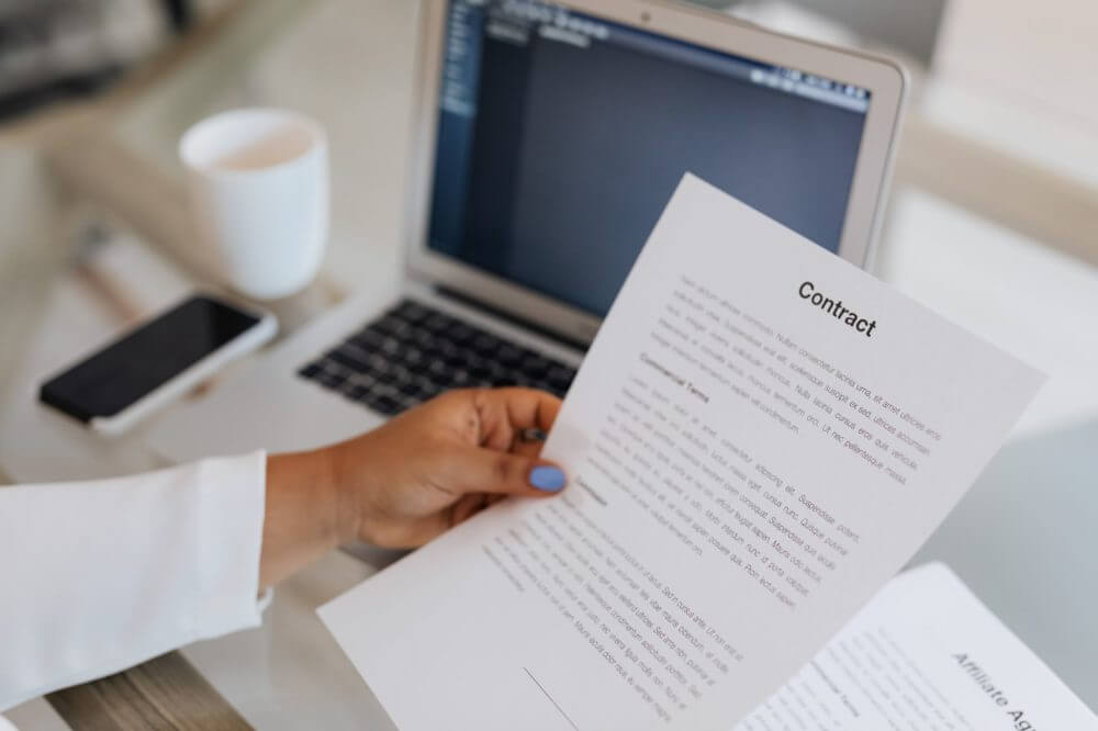 A woman reading a contract