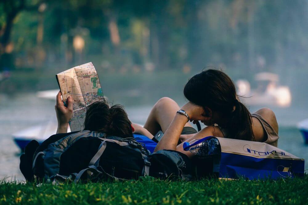 family walking in a park after moving long-distance