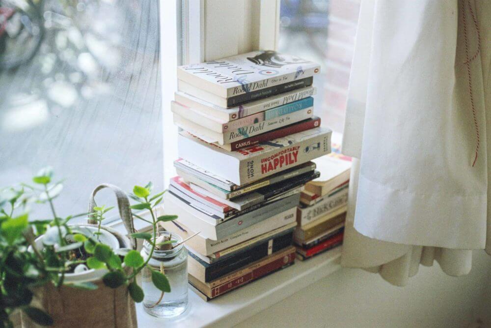 books by the window during the day