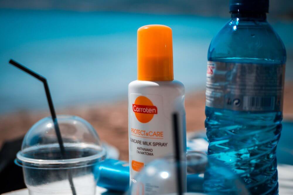 sunblock and a bottle of water
