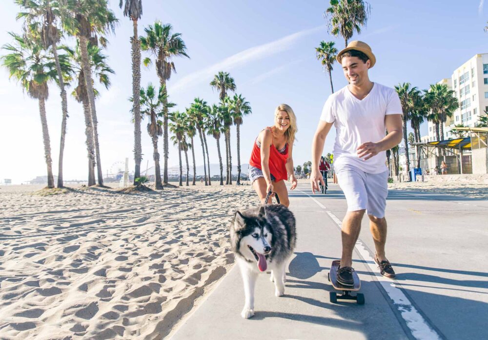 couple of people with a dog in Los Angeles California