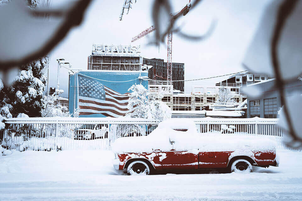 car covered in snow during winter