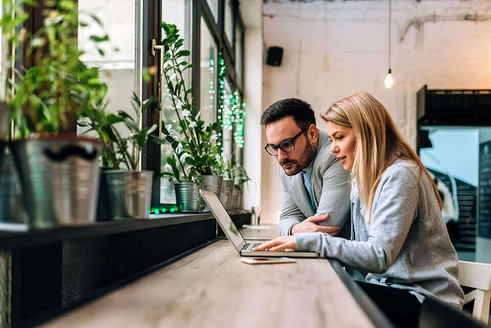 couple working on a laptop