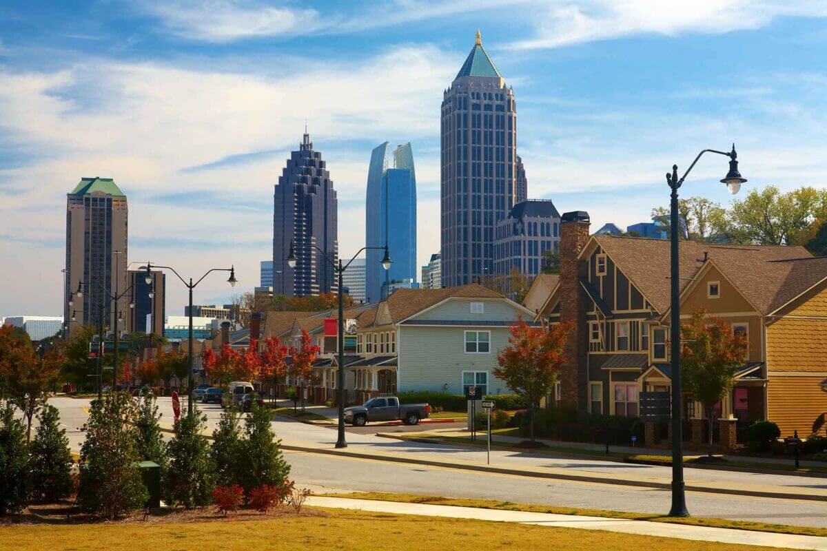 Houses and cars against the midtown. Atlanta, GA. USA.