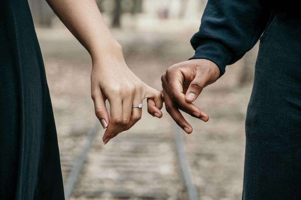 a couple holding hands