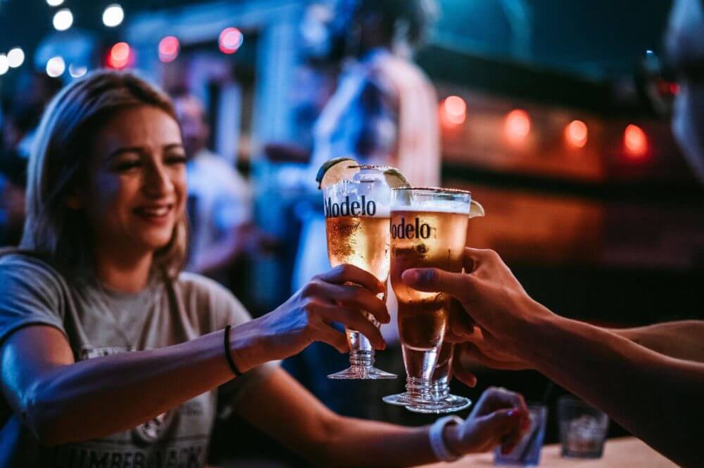 girl in the bar drinking beer