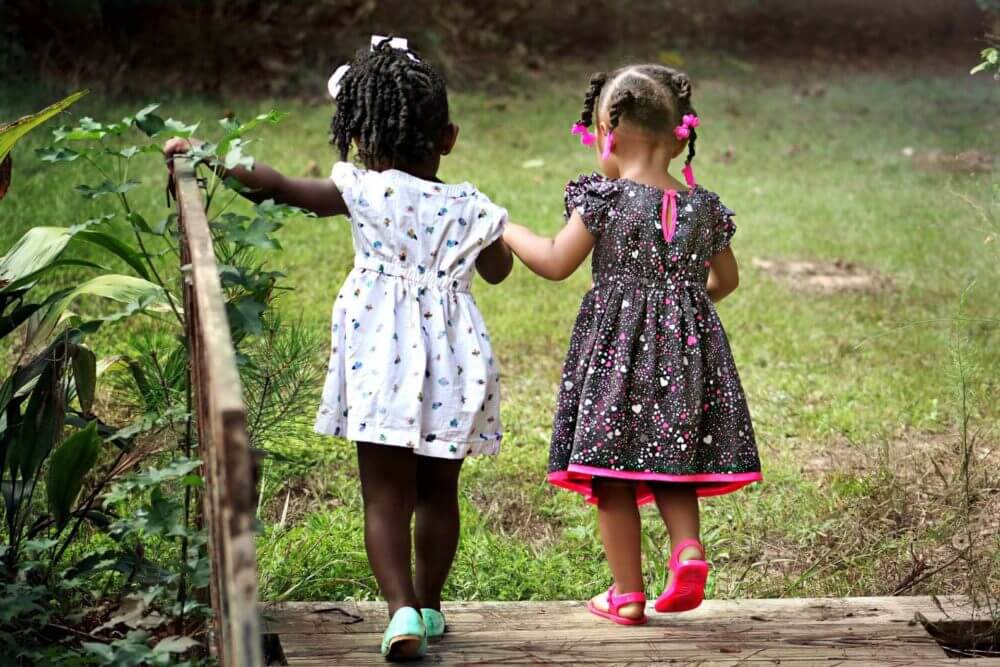 Kids playing in the park before cross-country moving