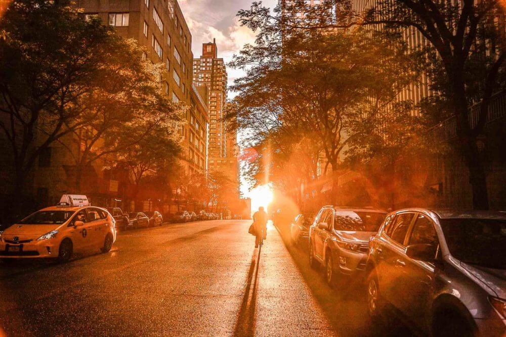 streets of new york city during the sunrise