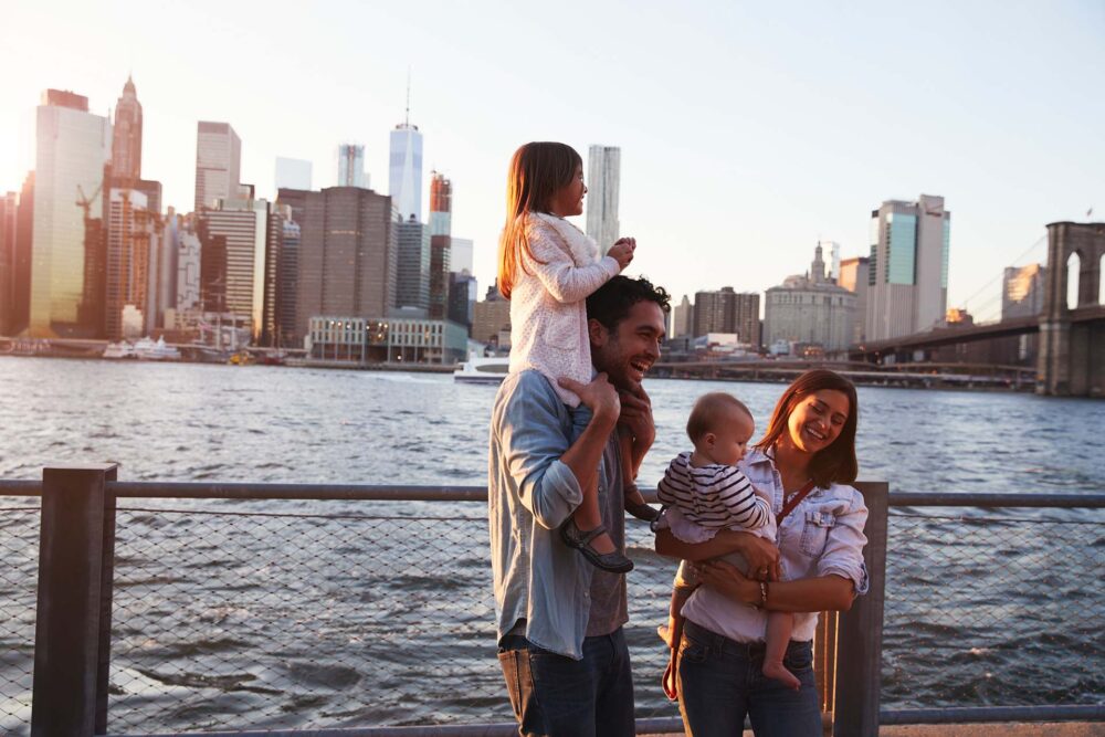 Family standing on the quayside