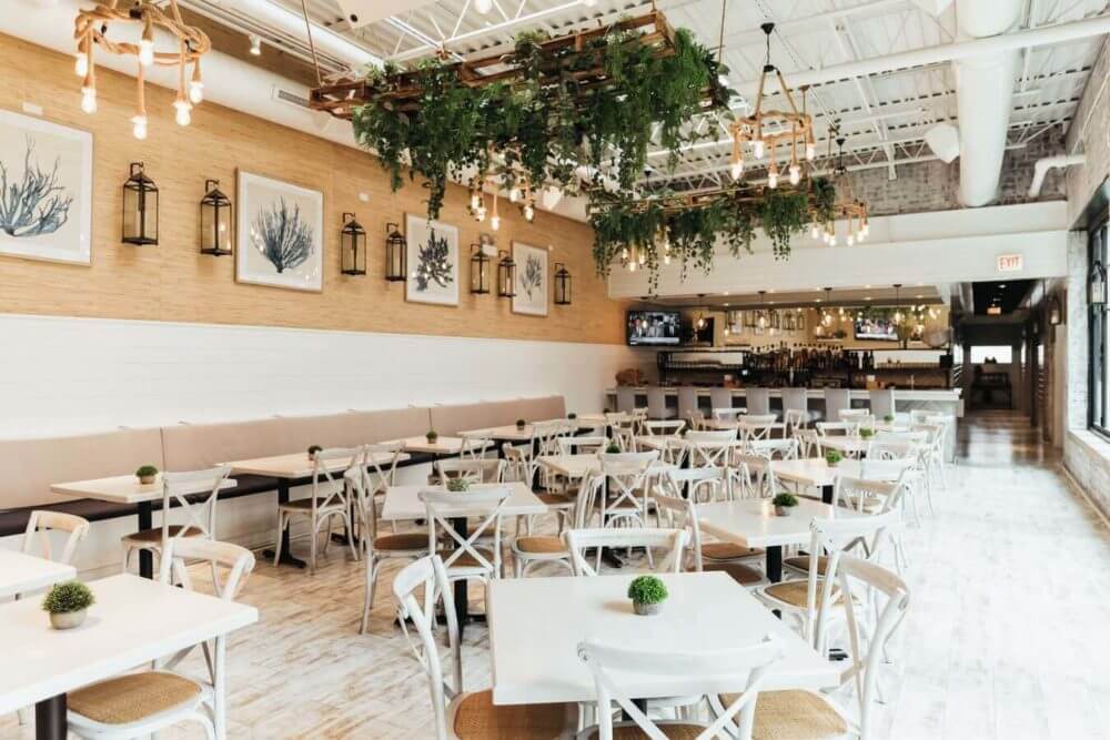 restaurant with white chairs 