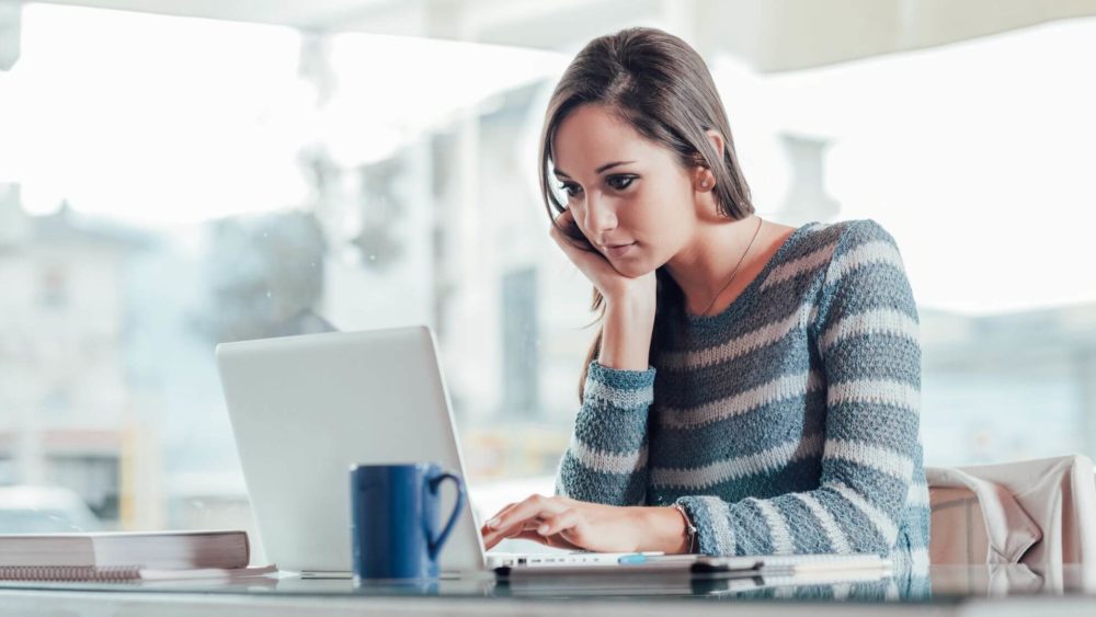 A person working on a laptop  