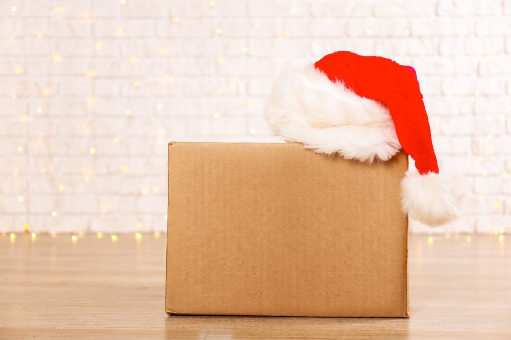 A carboard with Santa's hat