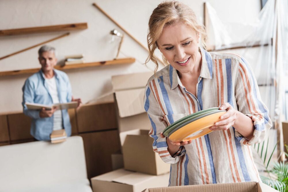 A woman holding plates