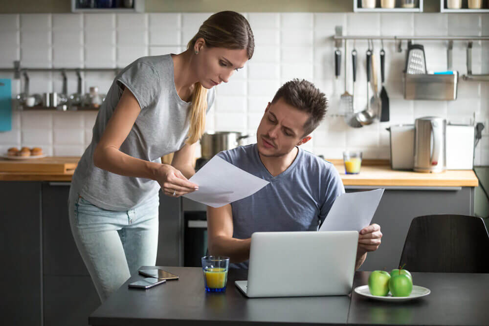 two people looking at a document