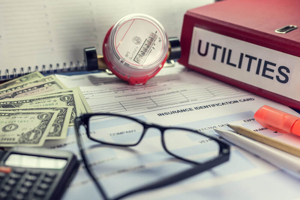 a pair of glasses on top of documents