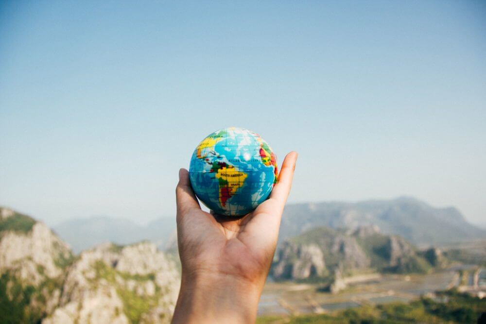 Little globe in man's hand