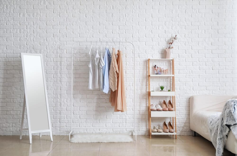 Clothing rack with dresses hanging