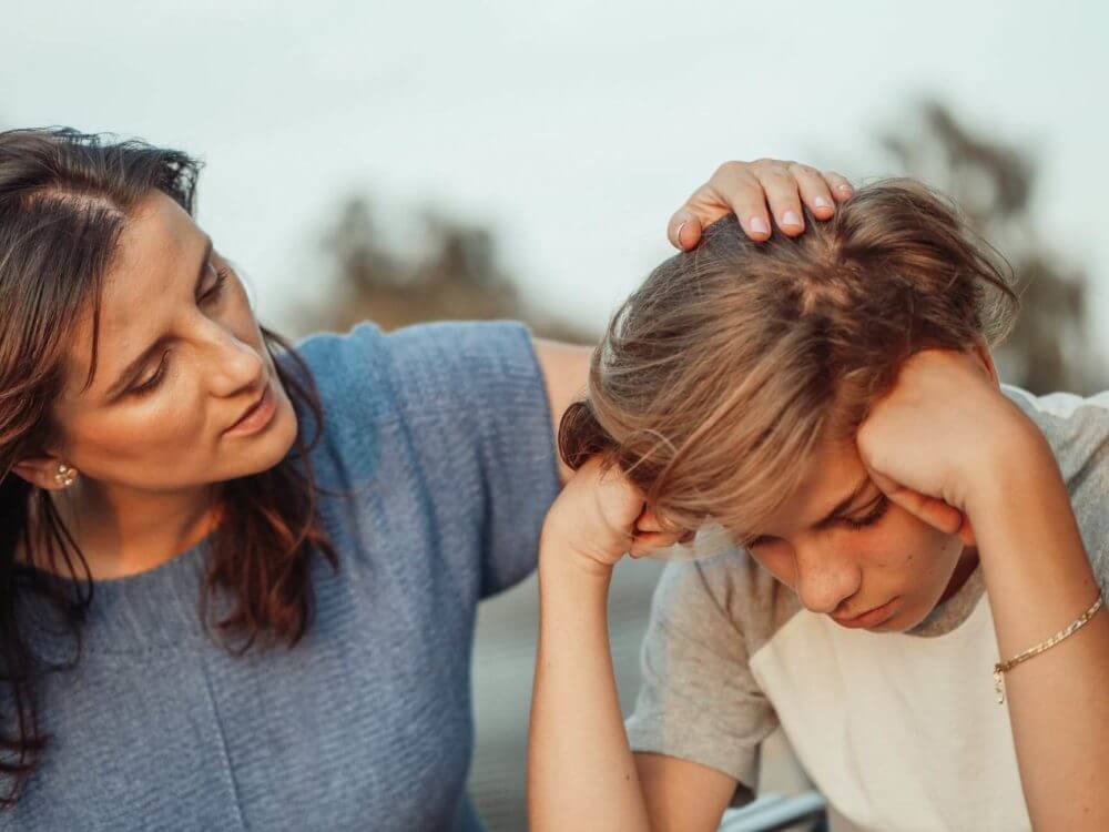 A mother comforting her shield after cross-country moving