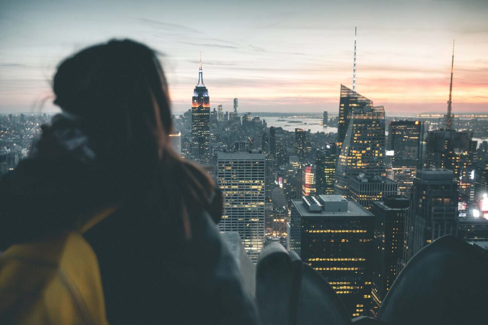 Girl enjoying Manhattan Sunset View - New York
