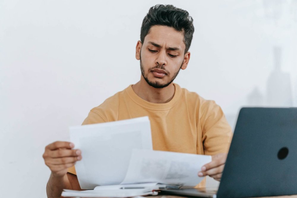 A man looking through documents