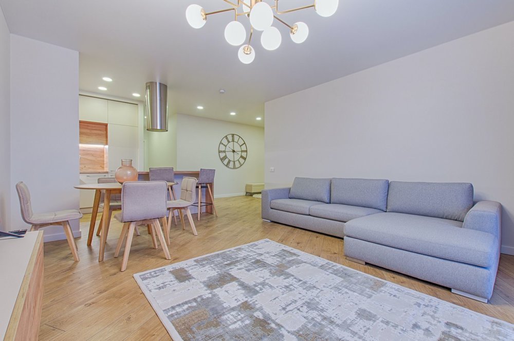 a couch and dining table in one space, a living/dining mix