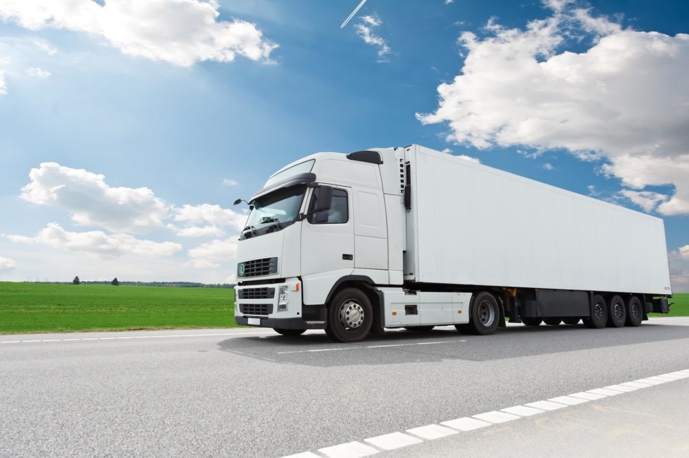 A white truck on the road