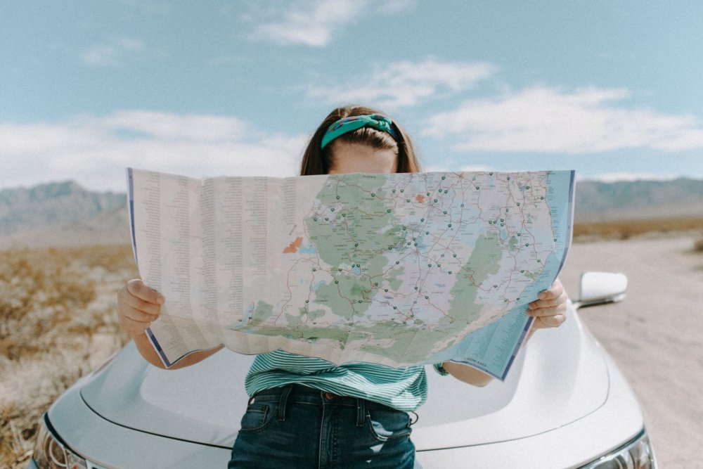 girl holding a map