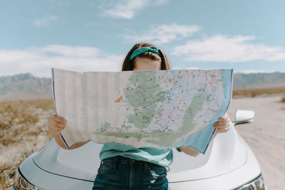 A woman looking at a map