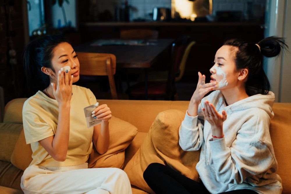 Two friends sitting on a sofa