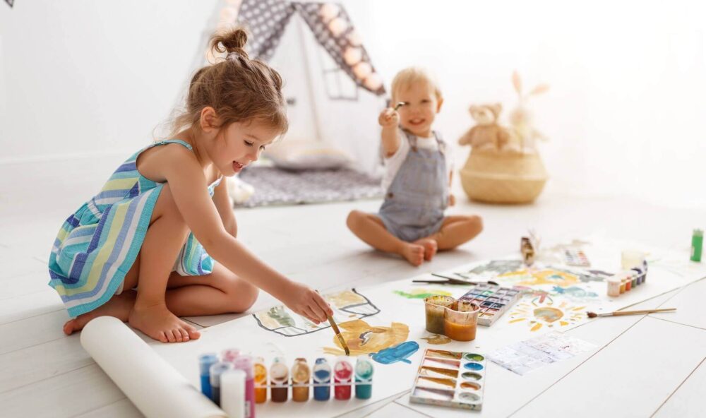 Children playing with toys in their room