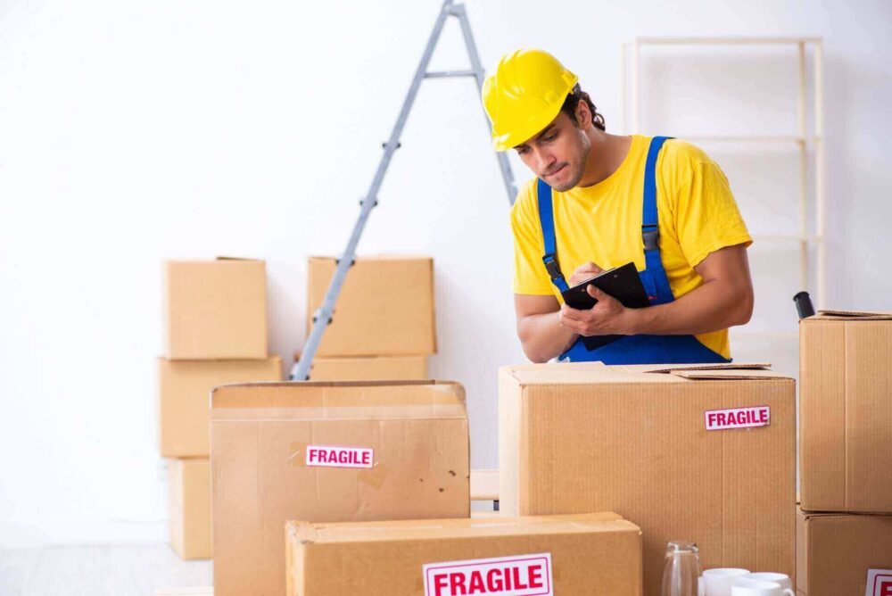 professional movers packing up the chair