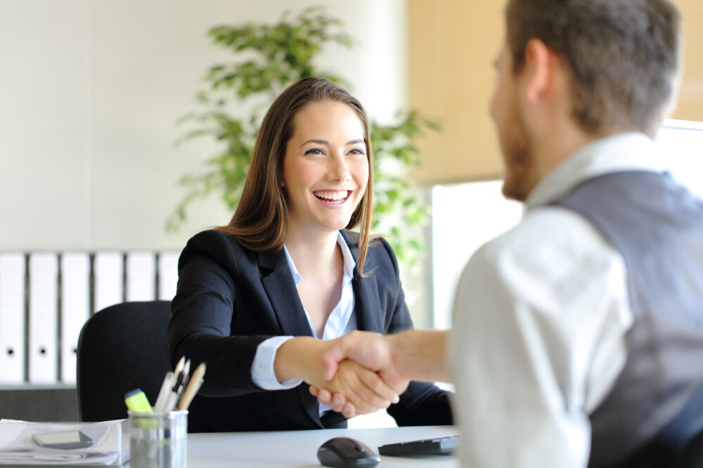 two people handshaking 