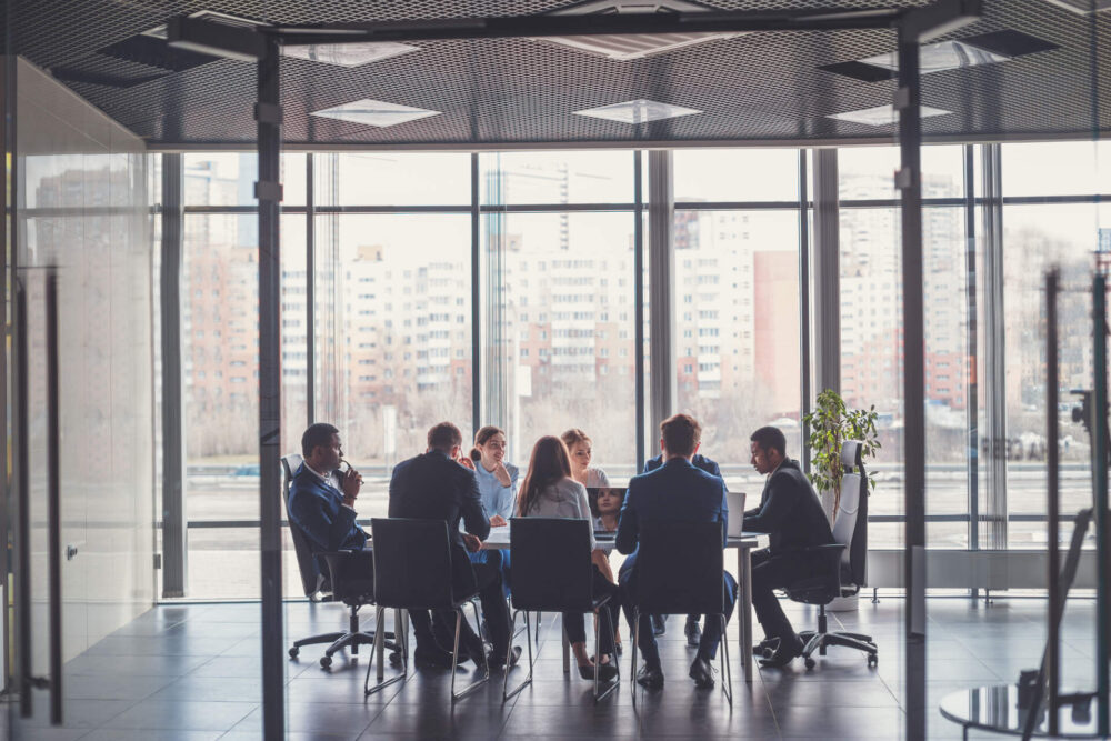 People sitting around an office table