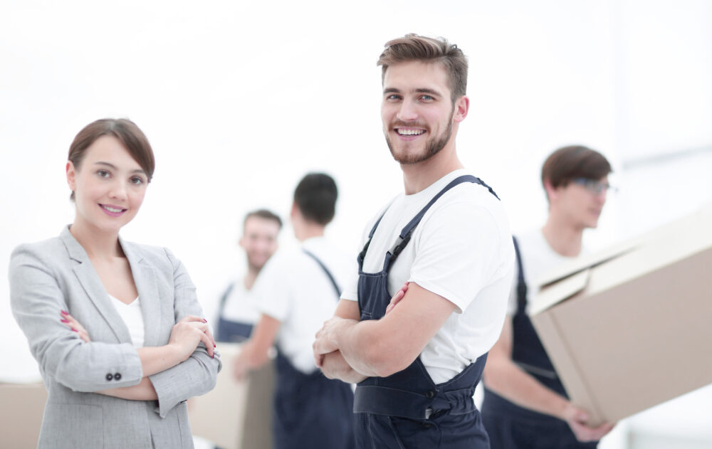 Woman and one of the long-distance movers smiling