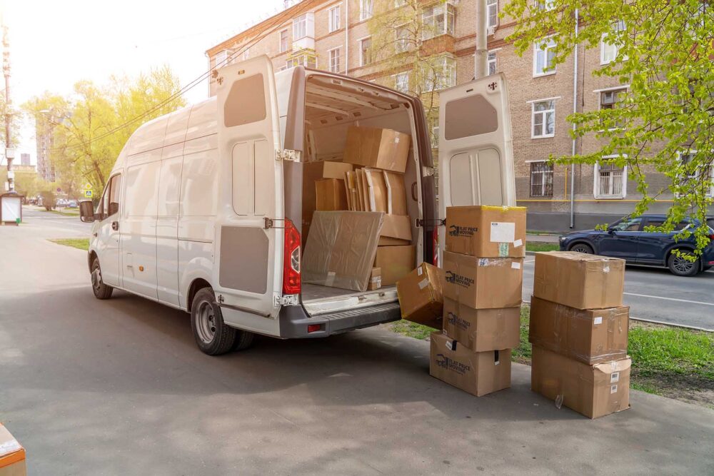 Flat Price Auto Transport and Moving Truck and Boxes on the street 