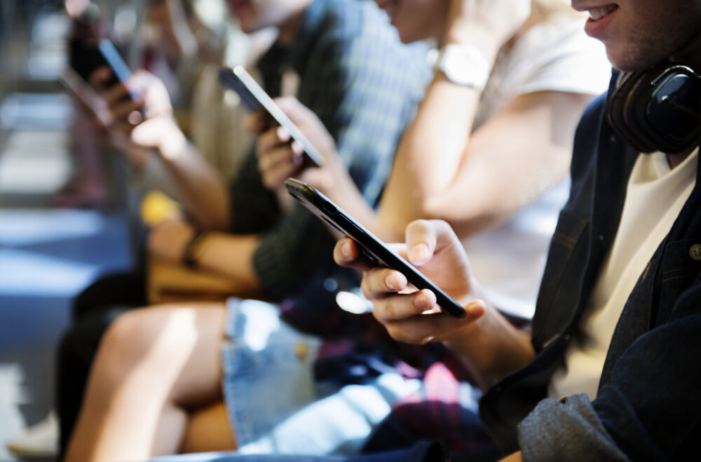 People holding phones 