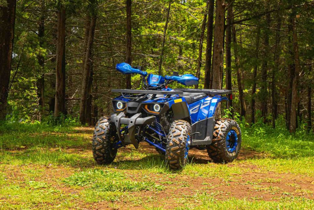  A blue quad bike in the forest 