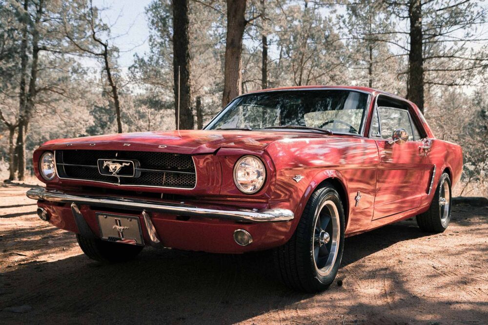 A red vintage car before long-distance moving