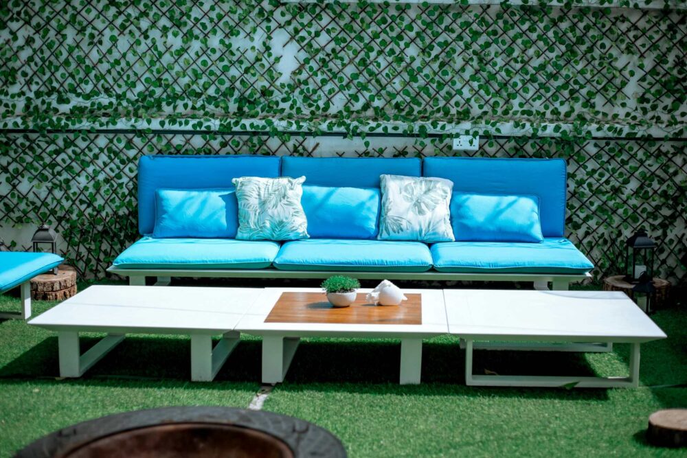 Blue garden sofa and a table