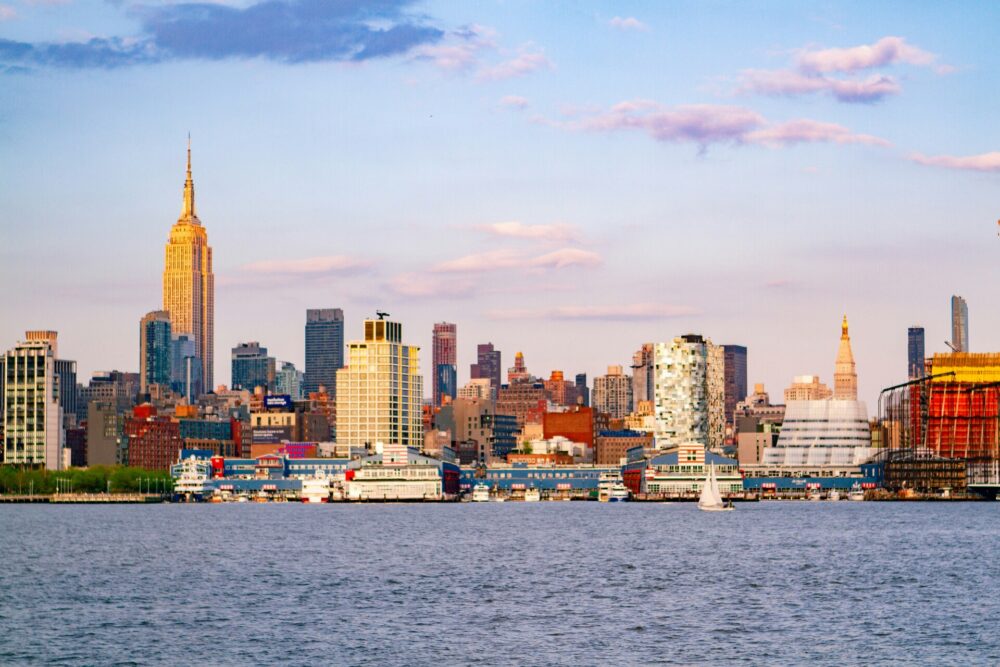 A beautiful daytime view of the modern New Jersey skyline across the water.